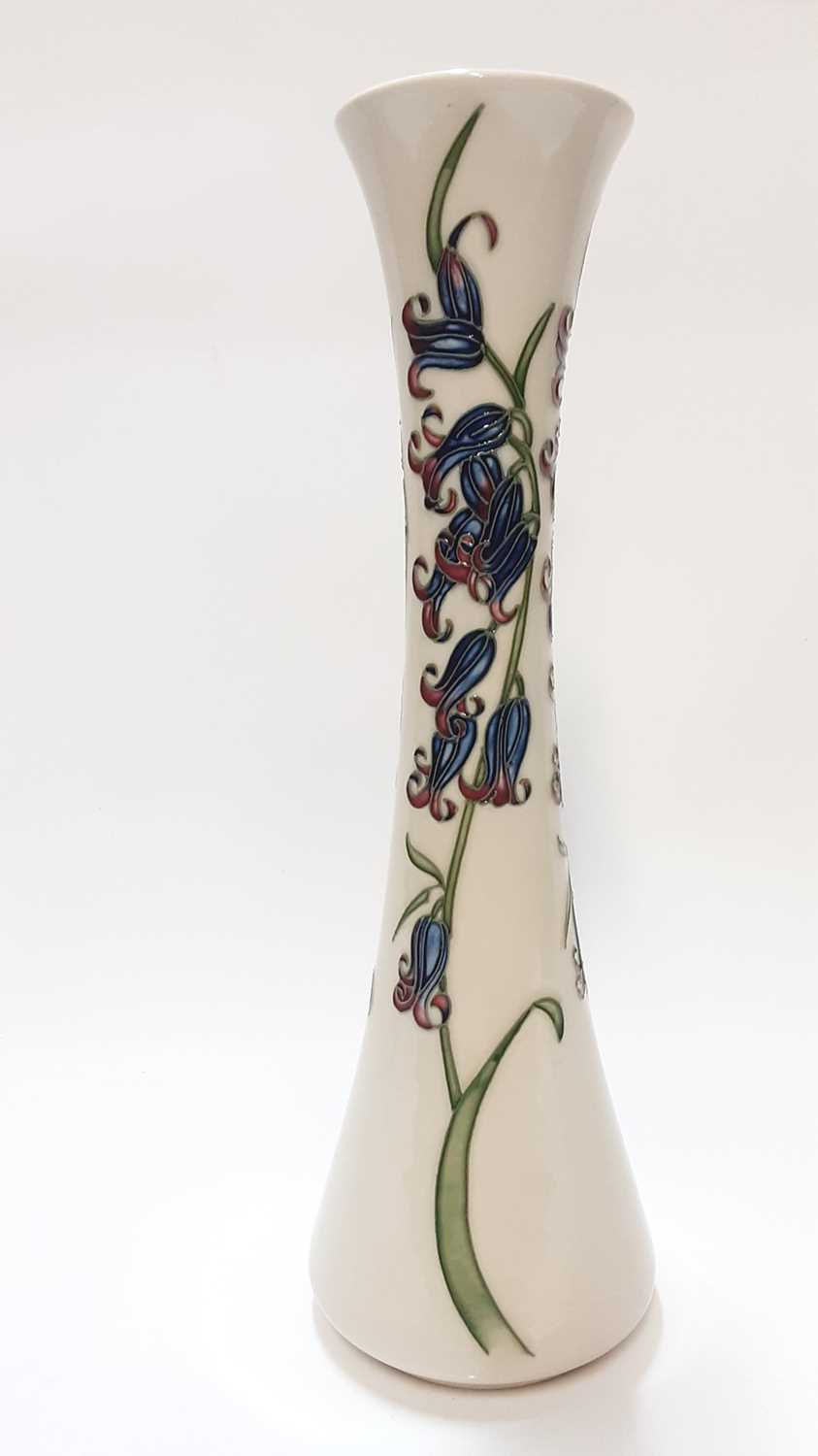 Lot 1176 - Moorcroft pottery vase decorated in the Bluebell Harmony pattern, dated 2009, 31cm high