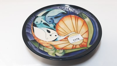 Lot 1178 - Moorcroft pottery limited edition plate decorated with three Doves, numbered 119 of 200, signed E. Bossons, 22cm diameter