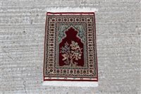 Lot 1218 - Small silk prayer rug with bird in tree mihrab...