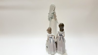 Lot 1167 - Impressive Lladro porcelain figure group of a Bride and two Bridesmaids, 35cm high, 28cm wide