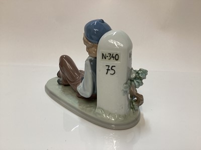 Lot 1186 - Three Lladro porcelain figures - mother and daughter 5449, girl with basket of flowers 5416 and boy resting 5399