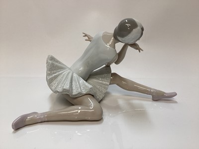 Lot 1188 - Lladro porcelain ballerina, Lladro figure of a girl with balloons, Nao figure a one other Spanish figure (4)