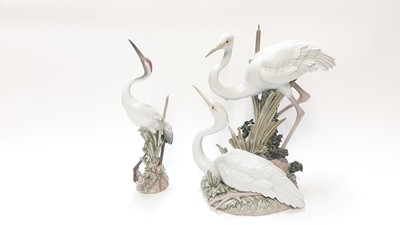 Lot 1189 - Two Lladro porcelain models - Dancing Crane 1614 and Herons Marshland Mates 5691 (both damaged)