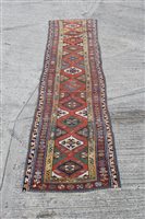 Lot 1224 - Kasak runner with central brick-red field...