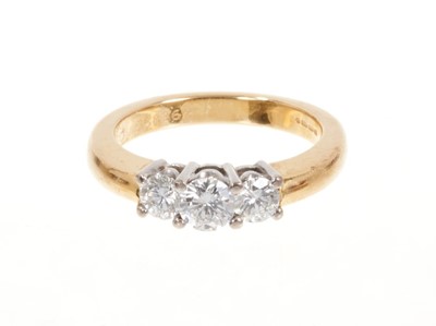 Lot 434 - Leo Diamond three stone ring with three round brilliant cut diamonds estimated to weigh approximately 0.80cts in total, in four claw setting on 18ct yellow gold shank.
