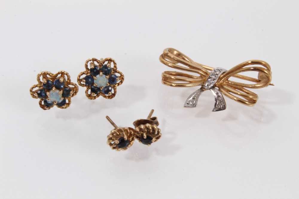 Lot 436 - 9ct gold bow brooch together with a pair of opal and sapphire cluster earrings and a pair of sapphire stud earrings