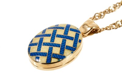 Lot 437 - 9ct gold and enamel locket with blue and yellow guilloché enamel lattice work decoration on 9ct gold chain.