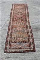 Lot 1225 - Kasak runner with staggered lozenge medallions...