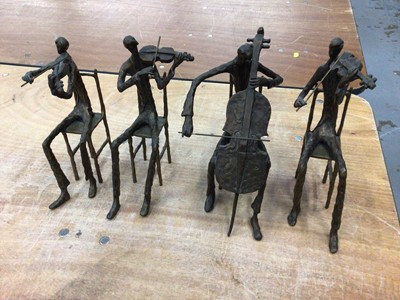 Lot 15 - A set of four bronze figures of musicians