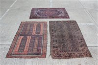 Lot 1232 - Iranian rug, the cream field centred by...