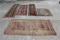 Lot 1235 - Persian rug, the cream field with allover...