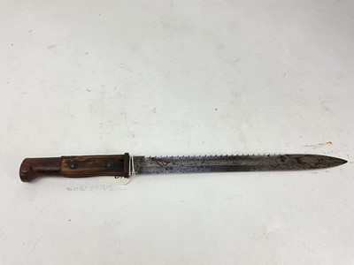 Lot 869 - Imperial German M84/98 sawback bayonet, with traces of markings visible to steel blade, no scabbard.