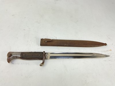 Lot 871 - Second World War Nazi German KS98 bayonet with plastic checkered grips, in a steel steel scabbard.