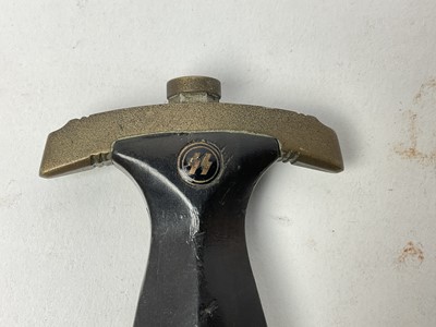 Lot 875 - Scarce Nazi SS model 1933 dress dagger, with ebonised wood grip and nickel plated fittings - the crossguard marked with 'I', the blade etched 'Meine Ehre heist True' and Rich Herder Solingen, retai...