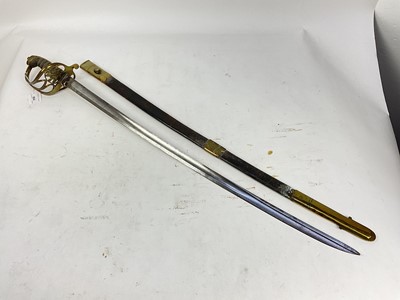 Lot 804 - Victorian 1845 Pattern Infantry officer's sword with brass Gothic hilt, unusual fullered blade with pipe back tip in brass mounted leather scabbard