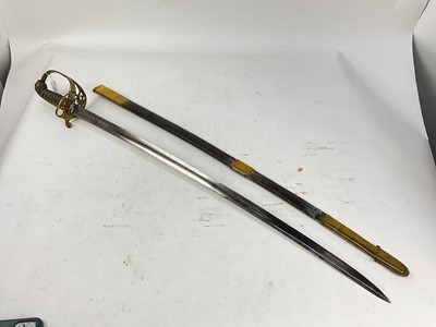 Lot 804 - Victorian 1845 Pattern Infantry officer's sword with brass Gothic hilt, unusual fullered blade with pipe back tip in brass mounted leather scabbard