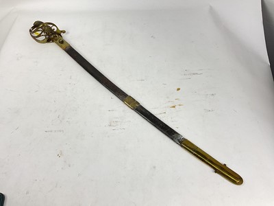 Lot 804 - Victorian 1845 Pattern Infantry officer's sword with brass Gothic hilt, unusual fullered blade with pipe back tip in brass mounted leather scabbard