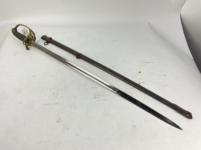 Lot 805 - Victorian 1845 Pattern Infantry officer's sword with brass Gothic hilt, etched fullered blade with crowned VR cipher in steel scabbard.