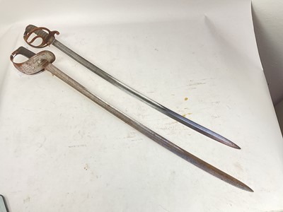 Lot 814 - Victorian Royal Artillery Officer's sword with etched blade and Victorian Cavalry trooper's sword (both without scabbards) (2)