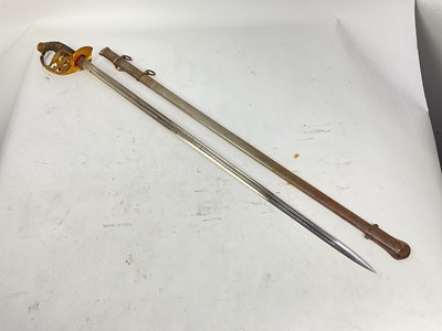 Lot 818 - Imperial German 1889 Pattern Infantry Officer's sword with gilt brass eagle mounted hilt, plain fullered blade in nickel plated scabbard