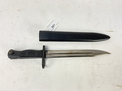 Lot 861 - British Sterling sub machine gun bayonet with black plastic grips, steel blade and painted steel scabbard.