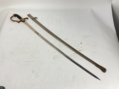 Lot 825 - 1920s Dutch Officer's sword with brass stirrup hilt and lions head pommel, plain plated curved blade marked ' Yzerhouwer' in nickel plated scabbard