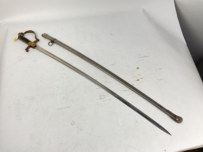 Lot 825 - 1920s Dutch Officer's sword with brass stirrup hilt and lions head pommel, plain plated curved blade marked ' Yzerhouwer' in nickel plated scabbard