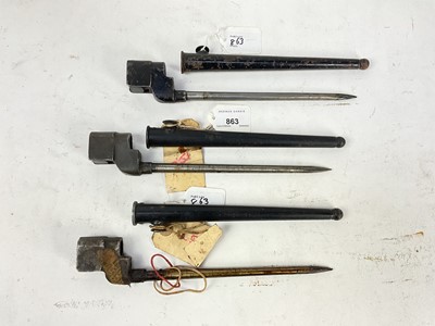 Lot 863 - Second World War British No.4 MK II Spike bayonet in scabbard, together with two other similar bayonets (3).