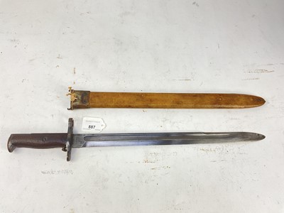 Lot 887 - Scarce American 1905 pattern sword bayonet for the 1903 Springfield rifle, with two piece wooden grip and steel blade stamped SA 1918 and US 925972, in an unusual vellum / hide covered scabbard.