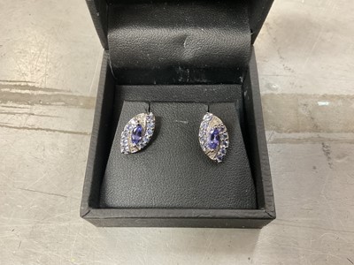 Lot 886 - Pair of 9ct white gold tanzanite earrings