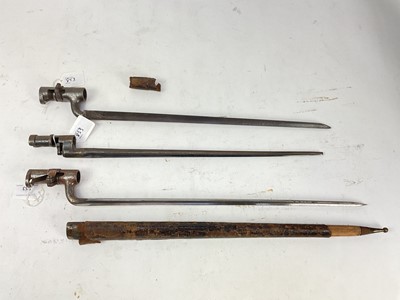 Lot 853 - Victorian 1853 pattern Enfield socket bayonet, together with two further socket bayonets, one with scabbard (3).