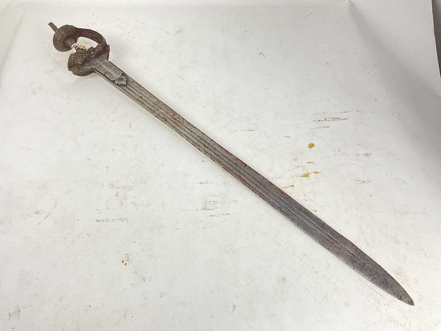 Lot 837 - Late 18th/19th century Indian Khanda sword with steel guard