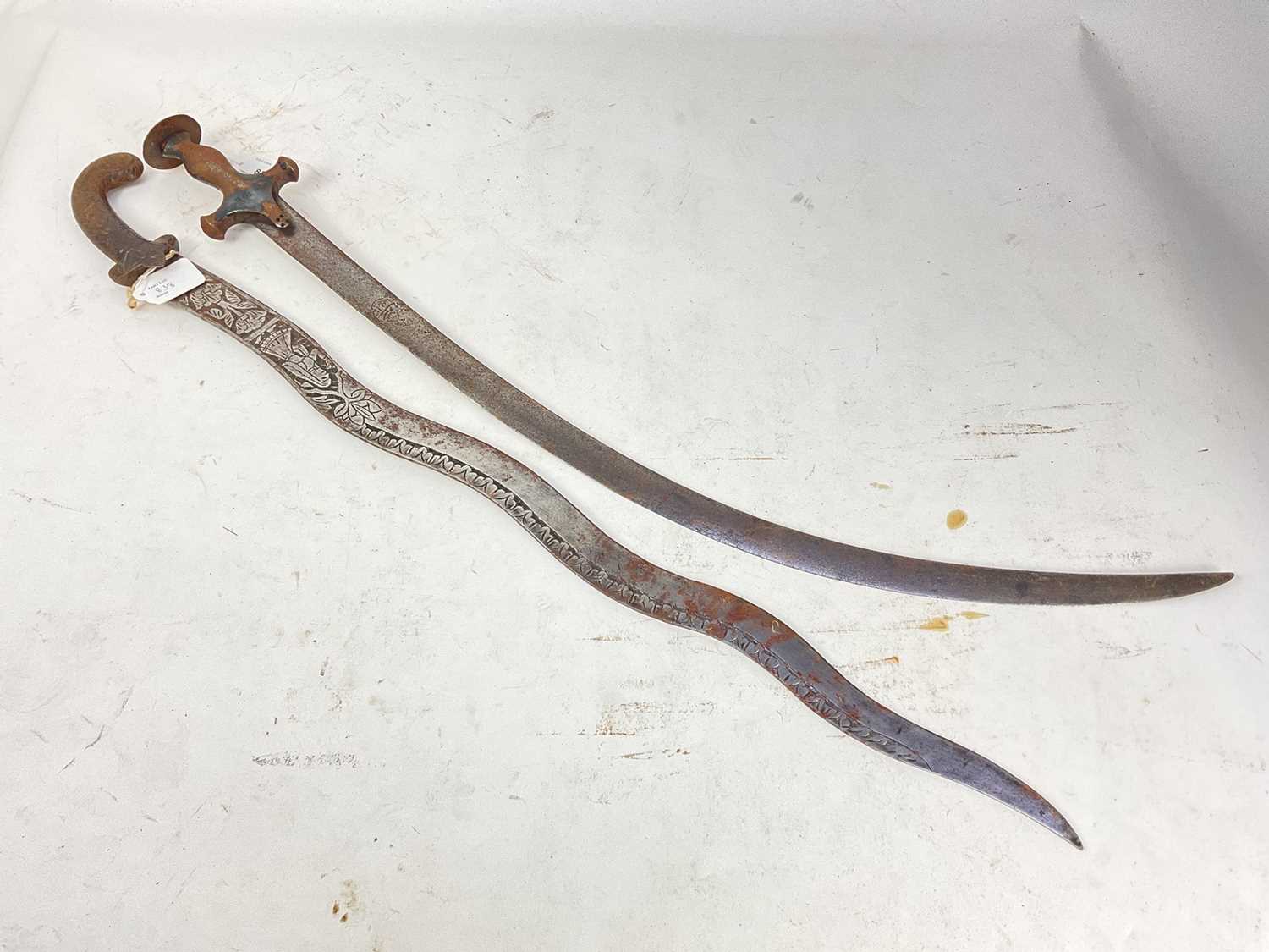 Lot 838 - 19th century Indian Tulwar with steel hilt