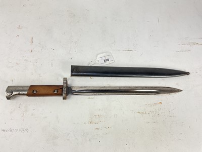 Lot 886 - Czech VZ-24 bayonet with to part wood hilt and steel blade stamped CSZ, with blued steel scabbard.