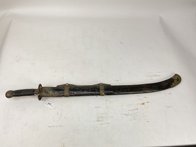 Lot 839 - Late 19th century Chinese military sword with brass mounts with scroll work arabesques, leather bound grip, slightly curved fullered blade in brass mounted shagreen covered scabbard, 80cm overall