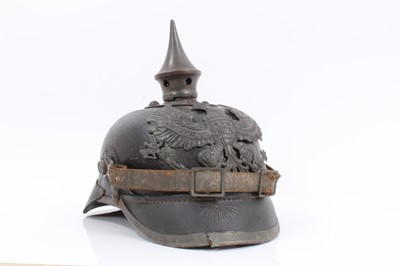 Lot 796 - First World War Imperial German Prussian Other Ranks Picklehaube helmet, with Prussian eagle plate to front and spike with circular base and grenade lighter brown leather head band and original lea...