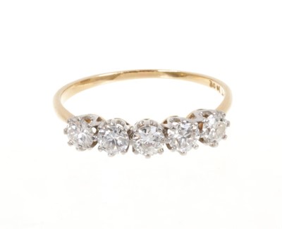 Lot 412 - Diamond five stone ring with five old cut diamonds in platinum claw setting on 18ct gold shank