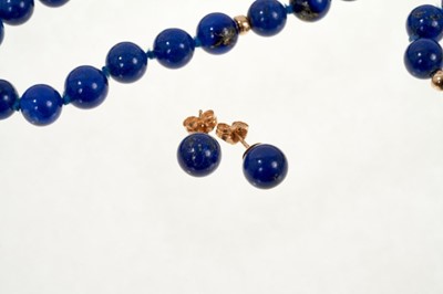 Lot 494 - Lapis lazuli bead necklace, bracelet and earrings with 14ct gold spacers