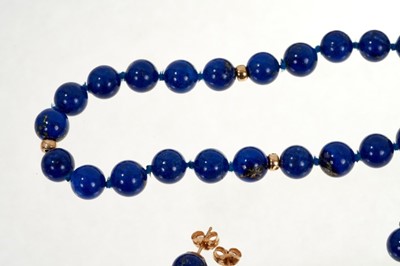 Lot 494 - Lapis lazuli bead necklace, bracelet and earrings with 14ct gold spacers