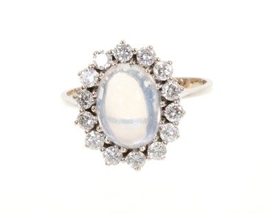 Lot 423 - Moonstone and diamond cluster ring