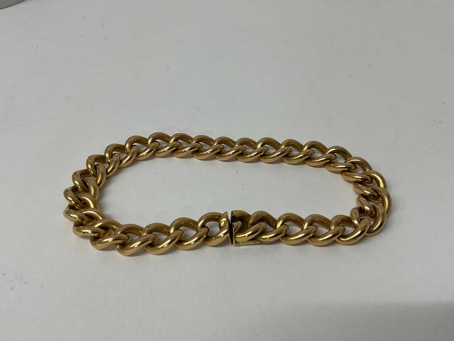 Lot 84 - Continental yellow metal curb link bracelet