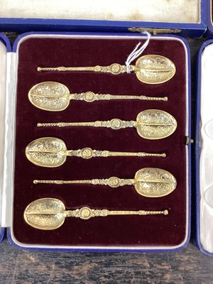 Lot 89 - George VI coronation silver gilt anointing spoon, cased, together with a similar cased anointing spoon with enamel inlay, also set of silver gilt anointing teaspoons and set of six coronati...