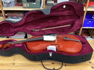 Lot 2215 - Full size cello by Gear 4 Music, cased with bow, with spare slip case and stand (3)