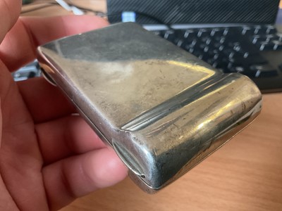 Lot 11 - Unusual George V silver tobacco box of rectangular form with gilded interior, marked Rd No. 554698, (London 1910), maker SW Smith & Co, 9cm in overall length, all at 3.5ozs