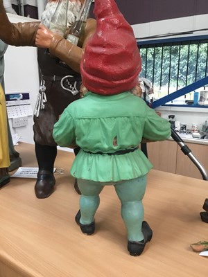Lot 746 - 1920s German terracotta type garden Gnome with impressed marks (under flower pots) and another smaller (2)