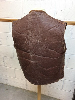 Lot 660 - Second World War period leather and sheepskin jerkin with button fasteners.