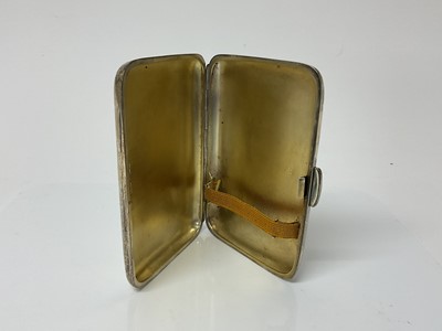Lot 16 - Edwardian silver cigarette case of rectangular form with  gilded interior, (Sheffield 1906), maker James Dixon & Sons, 12cm in overall length, all at 6.4ozs