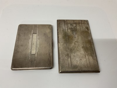 Lot 22 - George V silver cigarette case of rectangular form with engine turned decoration and gilded interior, (Birmingham 1921), 14.2cm in overall length, together with another similar silver cigarette cas...