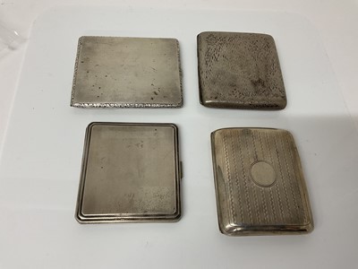 Lot 30 - Early 20th Century German silver cigarette case of rectangular form with engraved decoration, (stamped 800), 8.8cm in overall length, together with three another similar silver cigarette cases (Bir...