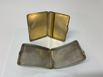 Lot 32 - George V silver cigarette case of rectangular form with engine turned decoration, the interior engraved 'C.M. Lithgow. R.N.' (London 1930), maker Padgett & Braham Ltd, 11cm in overall length, toget...
